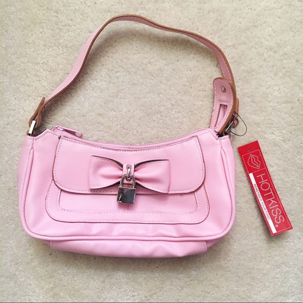 Pink bow and lock purse